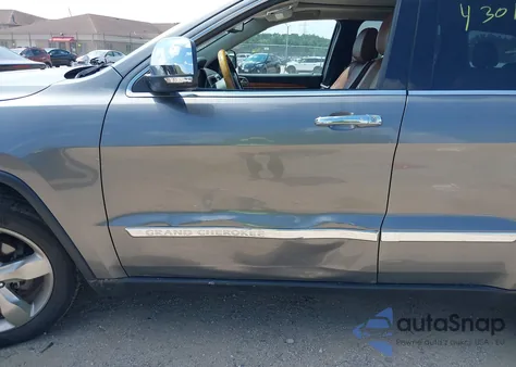 2013 Jeep Grand Cherokee Overland z USA, uszkodzony, nr VIN 1C4RJFCG6DC611798